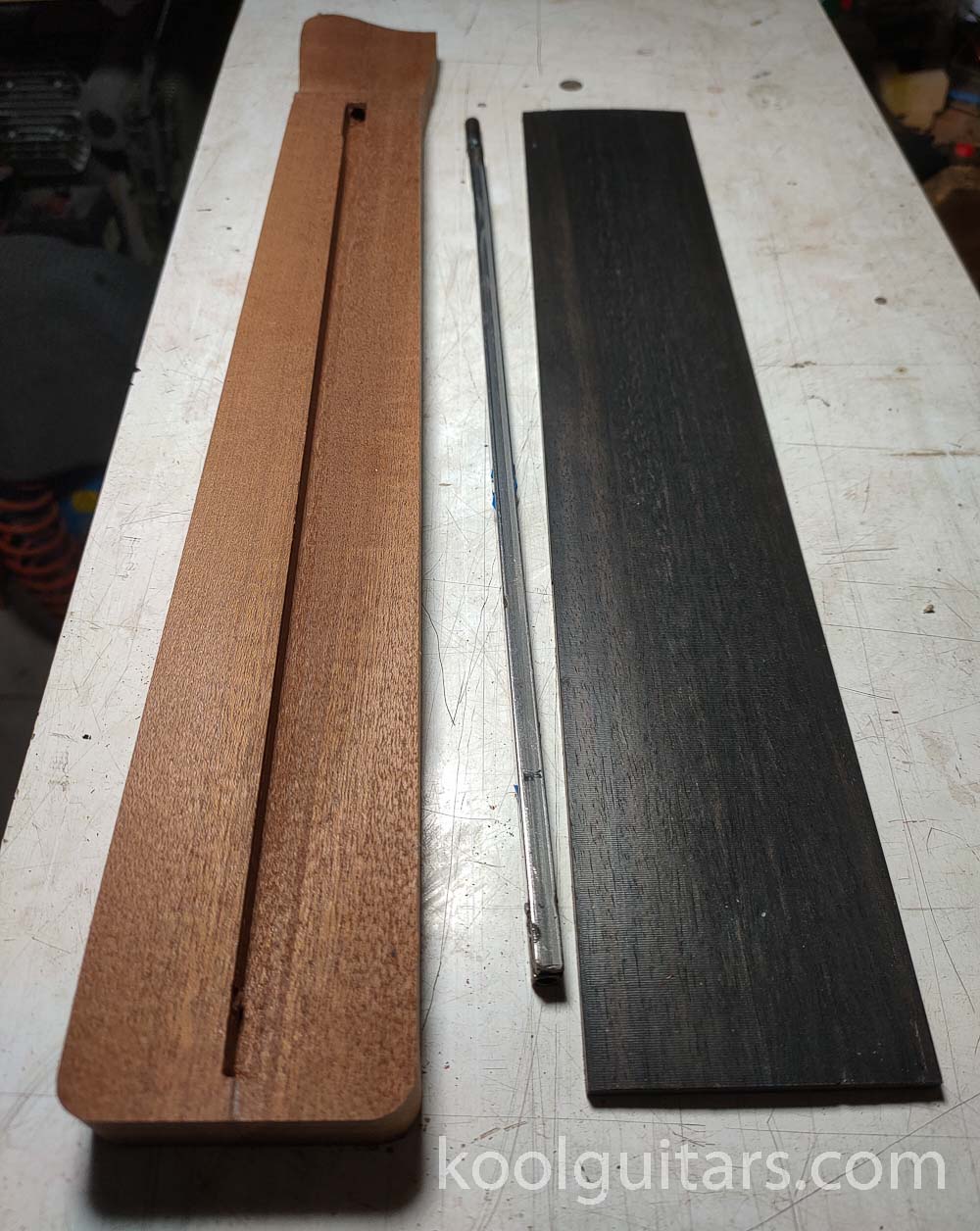 ebony fretboard, mahogany neck, kool guitars, custom guitar, headlessguitar, fretlessguitar